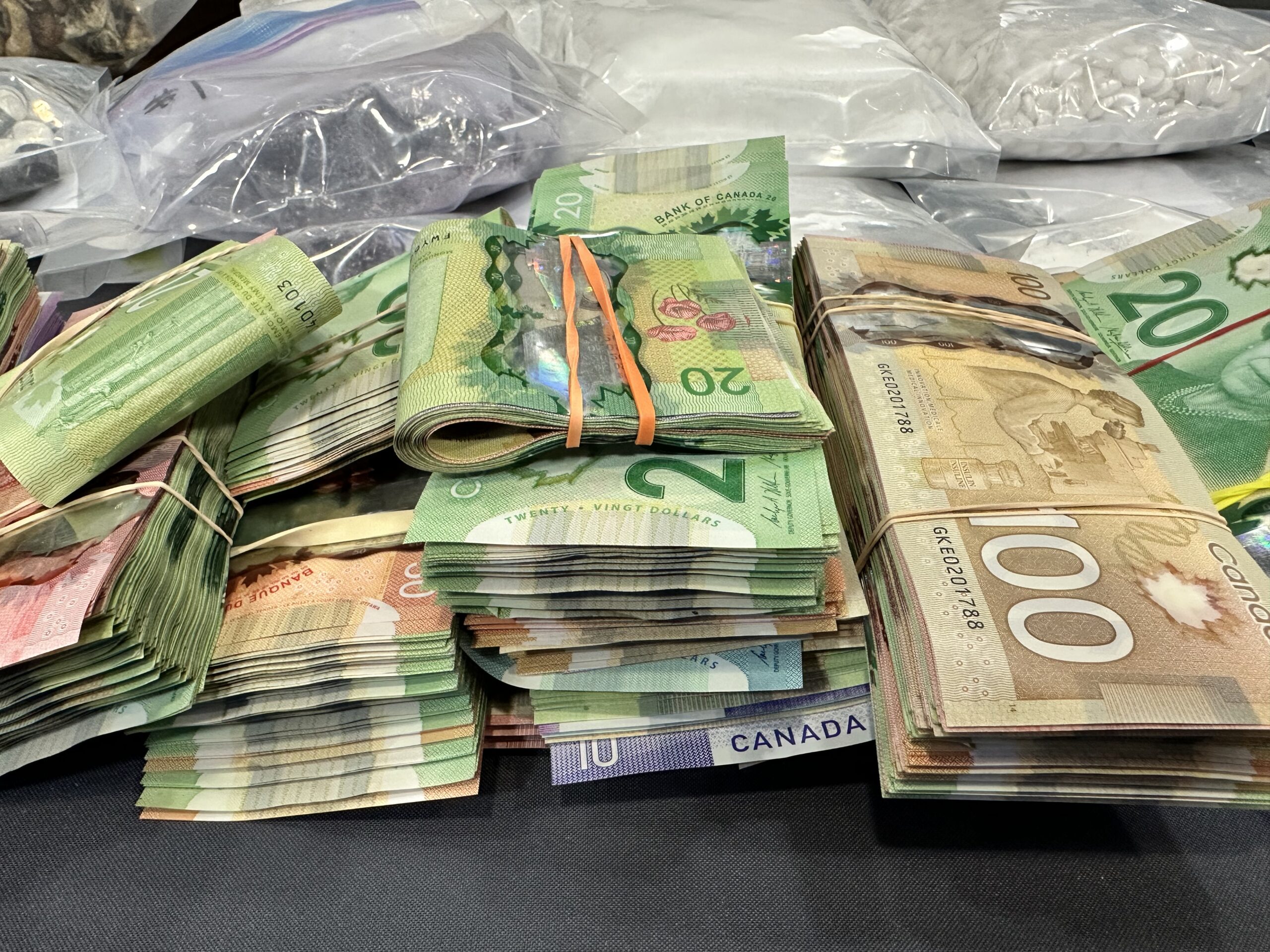 Large amount of cash and assets seized in Edmonton drug bust