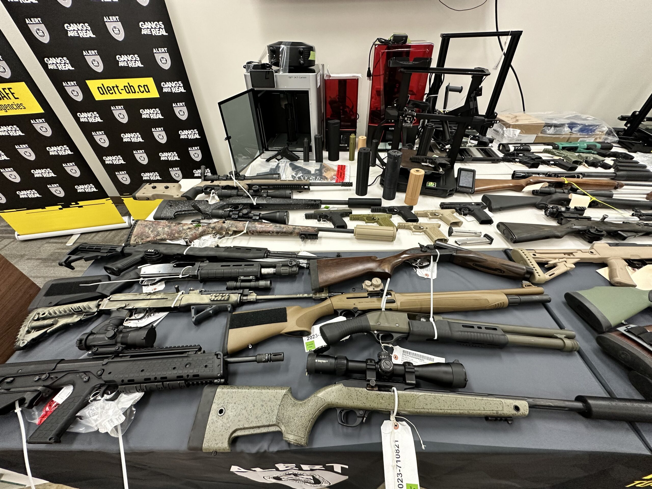 3D-printed firearms, handguns, and rifles seized from Innisfail and Penhold, Alberta.